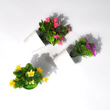 Decorative plastic flower pot for hotels.