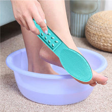 Foot scrubber with handle for pedicure.