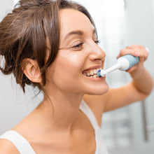 Electric toothbrush with deep cleansing bristles, battery-powered.