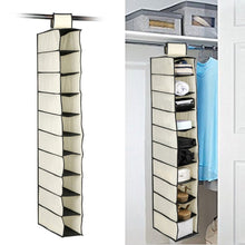 Foldable fabric organizer for clothes and accessories.