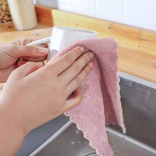 Multi-use kitchen wash towel in assorted colors for cleaning tasks